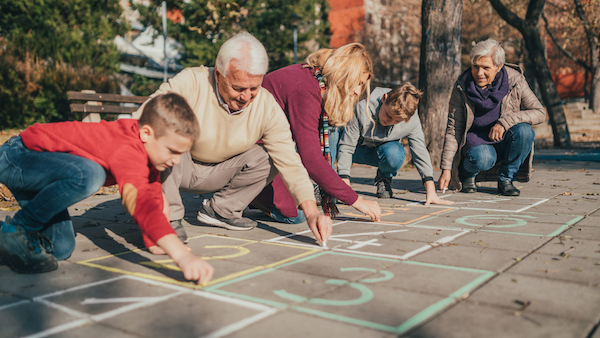 grandparents playing with grandkids